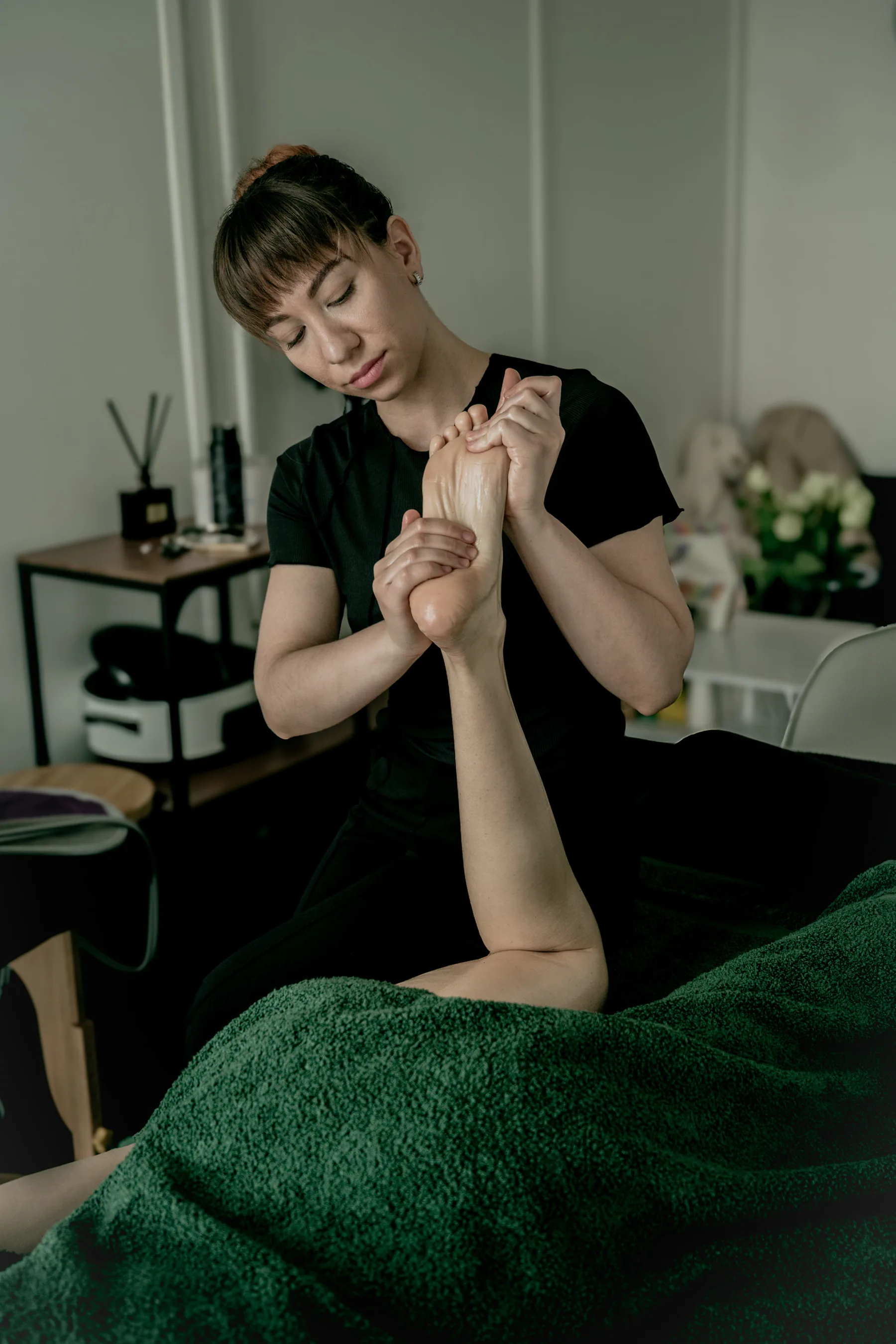 Alina performing foot massage